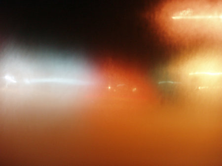 abstract background with bokeh defocused lights and beams.の写真素材