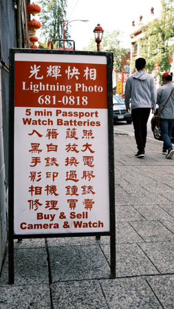 Sign of a photo and watch store in Vancouver's Chinatownのeditorial素材