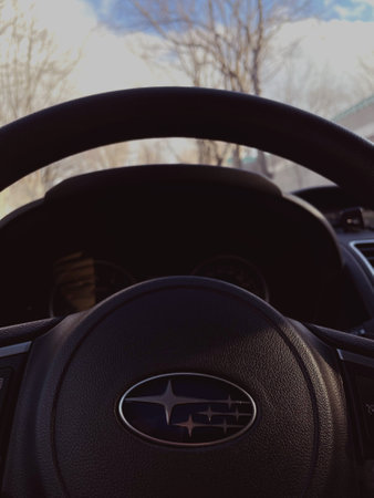 Close-up of the steering wheel of the Subaru.のeditorial素材