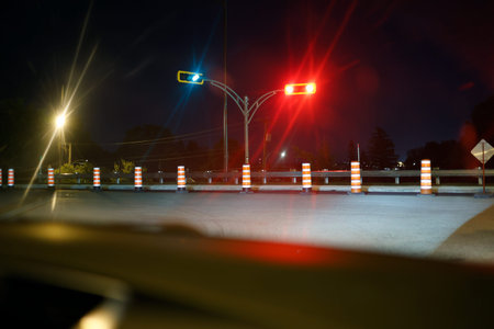 Traffic lights on the road at night, long exposure photo.