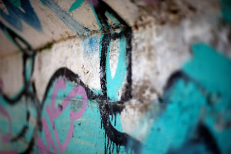 Graffiti on the wall of an abandoned building. Abstract background.の写真素材
