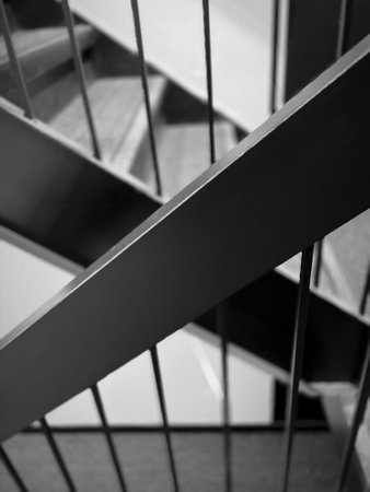 Black and white stairs in modern office building. Abstract architecture background.の写真素材