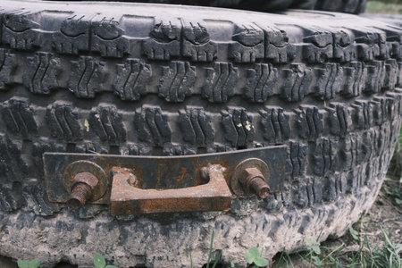 Close up of old car tire texture and background. Selective focus.