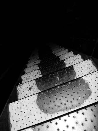 Staircase in the dark, closeup of photo. Black and whiteの写真素材