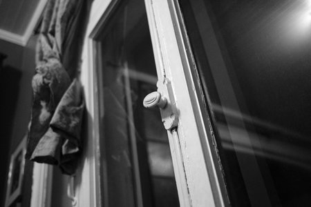 Close-up of the mechanism of an old window. Black and white photos.の写真素材