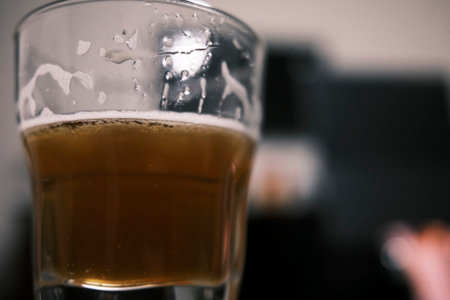 Beer in a glass on a dark background. Close-up.の写真素材