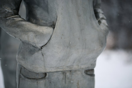 Detail of a statue of a man standing in a park.の写真素材