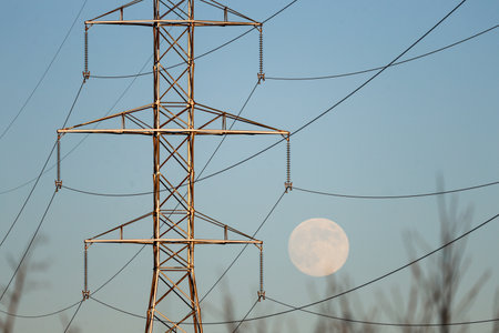 high voltage post.High-voltage tower at sunset or sunrise.の写真素材