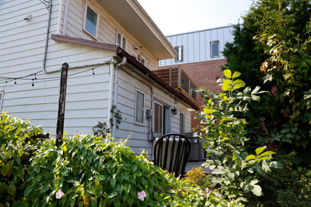 View of the front yard of a house. A view of the buildings in Quebec, Canada