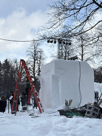Outdoor ice sculpture of an igloo in the city park. Quebec city, Canada