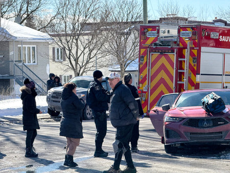 Firefighters at the scene of a car accident in Quebec city
