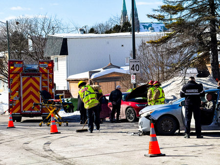 Firefighters on the scene of a car accident in Quebec city