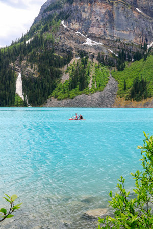 Kayaking on Lake Louise, Banff National Park, Alberta, Canadaの写真素材