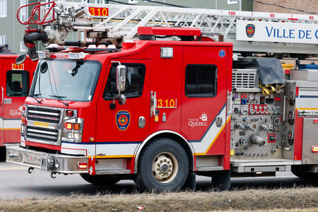 Quebec City firefighters on call for a fire. Quebec, Canada.
