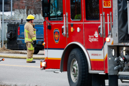 Firefighters and emergency vehicles on the streets of the city during a fire drill. Quebec City...