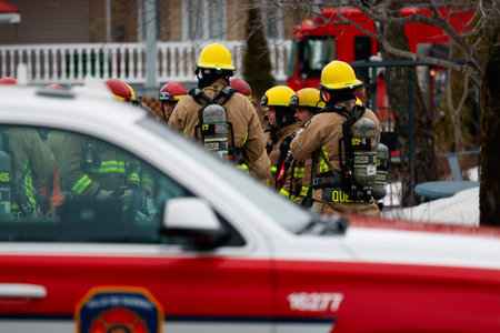 Firefighters and emergency vehicles on the streets of the city during a fire drill. Quebec City...