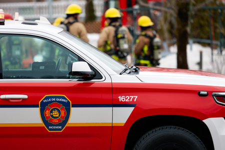 Firefighters and emergency vehicles on the streets of the city during a fire drill. Quebec City...