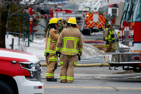 Firefighters and emergency vehicles on the streets of the city during a fire drill. Quebec City...
