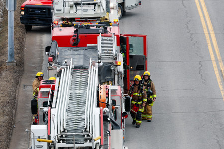 Firefighters and emergency vehicles on the streets of the city during a fire drill. Quebec City...