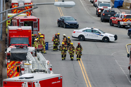 Firefighters and emergency vehicles on the streets of the city during a fire drill. Quebec City...