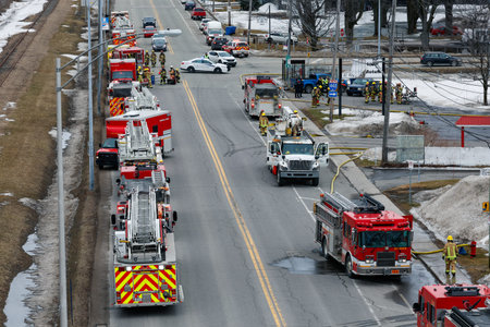 Firefighters and emergency vehicles on the streets of the city during a fire drill. Quebec City...
