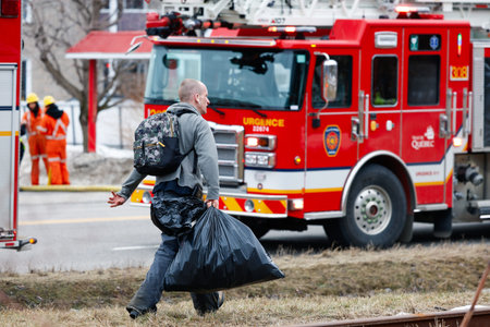 Quebec City firefighters on call for a fire. Quebec, Canada.