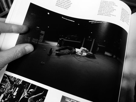 A photo of Doors singer Jim Morrison in a book.