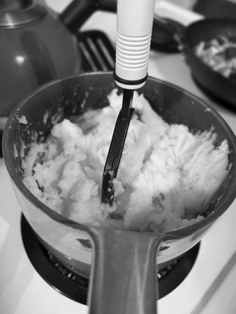 Preparation of mashed potatoes. Black and white photos.の写真素材