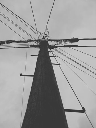 Electricity post on a cloudy day. Black and white photos.の写真素材
