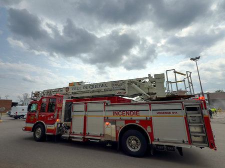 Firefighters respond to a fire in Quebec City. Fire trucks and vehicles in Quebec City. SPCIQ in...