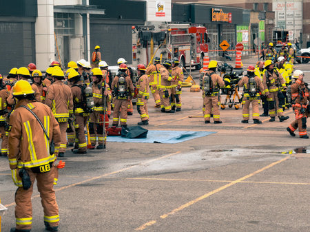 Firefighters respond to a fire in Quebec City. Fire trucks and vehicles in Quebec City. SPCIQ in Quebec City.のeditorial素材