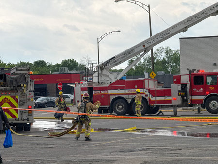 Firefighters respond to a fire in Quebec City. Fire trucks and vehicles in Quebec City. SPCIQ in...