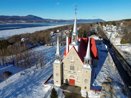 Aerial view of the church. The Church of the Holy Family is located in the village of Sainte-Famille on Ãle d'OrlÃ©ans in Quebec.の写真素材