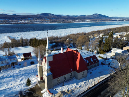 Aerial view of the church. The Church of the Holy Family is located in the village of Sainte-Famille on Ãle d'OrlÃ©ans in Quebec.の写真素材