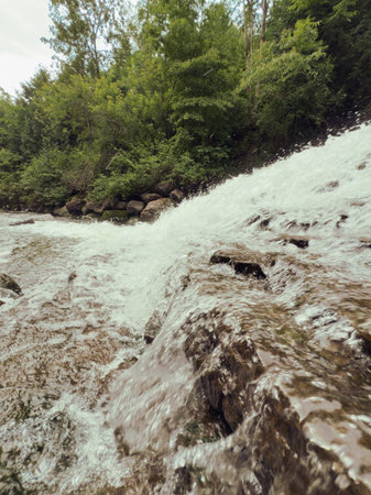 Waterfall in the forest in the summer.