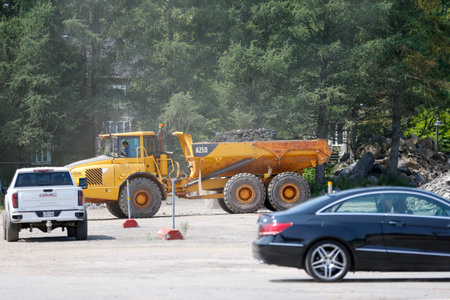 Dump truck on the construction site of a new road in the forest
