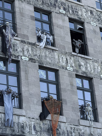 Halloween decorations on the facade of a building in downtown Montreal.のeditorial素材