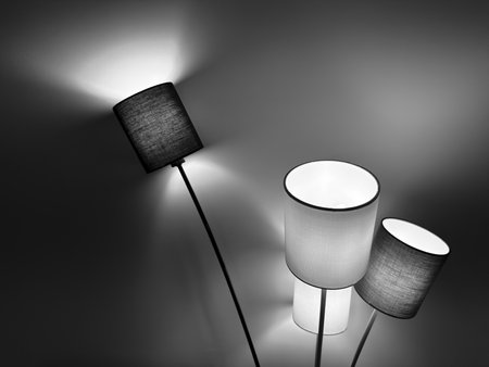 Black and white image of decorative lamps in the dark room.の写真素材