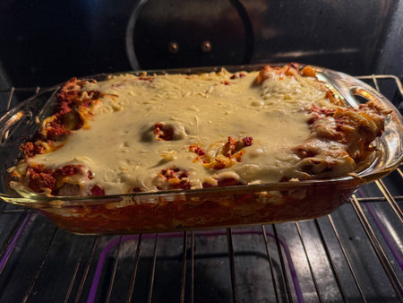 Baked lasagna with mozzarella cheese.の写真素材