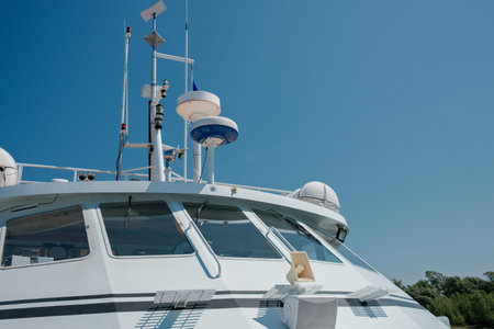 White yacht on the sea with blue sky in the background, close-up