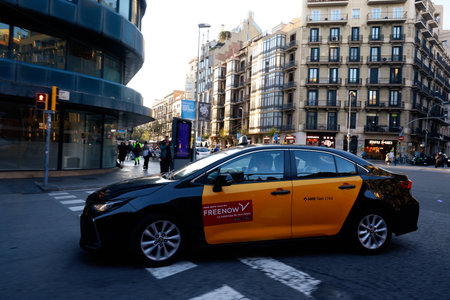 Yellow taxi in Barcelona, Spain.のeditorial素材