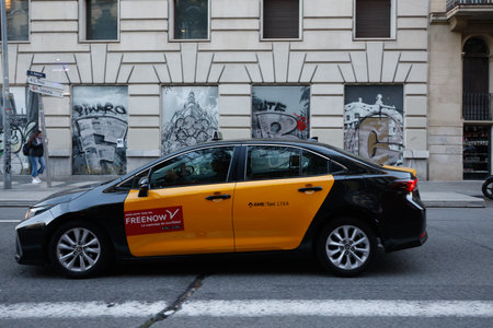 Yellow taxi in Barcelona, Spain.のeditorial素材