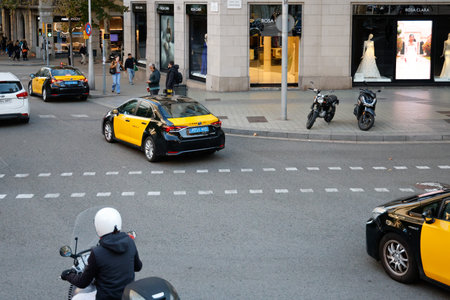 Barcelona Spain. Yellow taxi in Barcelona. Taxi on the streets of Barcelona.
