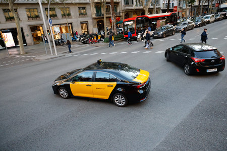 Yellow taxi in Barcelona. Taxi on the streets of Barcelona, Spain.