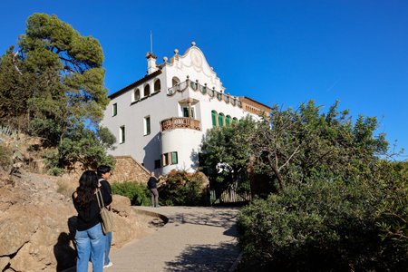 Architecture of the Park Guell in Barcelona, Spain. Tourists visiting Park GÃ¼ell in Barcelona.のeditorial素材