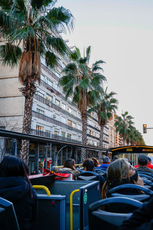 Tourists on a bus in Barcelona, Spain. Barcelona tourist buses. Double-decker buses in Barcelona. Tourists on a bus in Barcelona, Spain.のeditorial素材