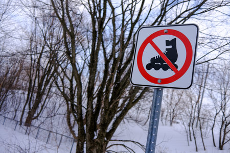 Inline skating is prohibited in winter. Warning sign.