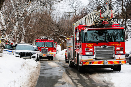 Firefighters at work in the fire brigade during a fire drill. Quebec City fire department...