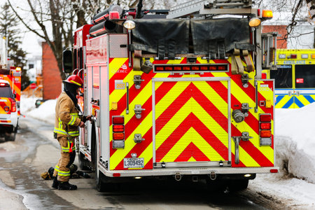 Firefighters at work in the fire brigade during a fire drill. Quebec City fire department...