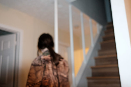 Blurred image of a woman walking up the stairs.の写真素材